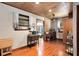 Charming kitchenette with hardwood floors, a wooden ceiling, and a full size microwave at 1533 Pine St, Apopka, FL 32703