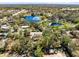 Aerial view of the property, close to a beautiful pond and other bodies of water at 1533 Pine St, Apopka, FL 32703