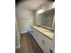 Elegant bathroom showcasing dual sinks, granite counters, and a modern design at 2722 Sw 151St Ave, Ocala, FL 34481