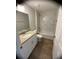 This new bathroom features a marble-tiled shower, granite counters and wood-look floors at 2722 Sw 151St Ave, Ocala, FL 34481