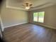 Serene primary bedroom featuring natural light, ceiling fan, and generous space at 2722 Sw 151St Ave, Ocala, FL 34481