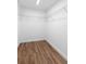 Walk-in closet with wood-look flooring and wire shelving at 2722 Sw 151St Ave, Ocala, FL 34481