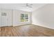 View of a living room with a large window and a view of the front entrance at 2722 Sw 151St Ave, Ocala, FL 34481