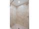 Tiled shower with stone-look tiles and rainfall showerhead at 2722 Sw 151St Ave, Ocala, FL 34481