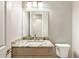 Bathroom featuring a granite countertop and a toilet at 2735 Se 19Th Ct, Ocala, FL 34471
