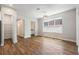 Bonus room featuring wood-look tile flooring, natural lighting, and neutral walls at 2735 Se 19Th Ct, Ocala, FL 34471