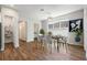 Dining Room featuring tile flooring, natural light, and views into the bonus room at 2735 Se 19Th Ct, Ocala, FL 34471