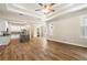Open concept floor plan with view of kitchen with island and stainless appliances at 2735 Se 19Th Ct, Ocala, FL 34471