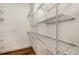 Walk-in closet featuring multiple wire shelves for optimal storage at 2735 Se 19Th Ct, Ocala, FL 34471