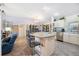 Bright, open-concept kitchen with an island and stainless steel appliances at 3407 Melbourne Ln, The Villages, FL 32163
