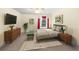 Bright main bedroom with a window, dresser, and a comfortable king-sized bed at 3407 Melbourne Ln, The Villages, FL 32163