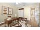 Cozy home office featuring a desk, storage, and closet with natural light at 3407 Melbourne Ln, The Villages, FL 32163