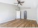 Vaulted ceiling bedroom features wood floors and entrance to walk in closet at 4541 Se 30Th St, Ocala, FL 34480