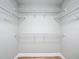 Walk-in closet with multiple shelves, perfect for storage at 4541 Se 30Th St, Ocala, FL 34480