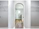Arched closet with wire shelving and wood floors at 4541 Se 30Th St, Ocala, FL 34480