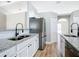Updated kitchen features granite counters, stainless steel appliances, and ample cabinet space at 4541 Se 30Th St, Ocala, FL 34480