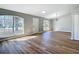 Bright living room with wood floors, natural light, neutral paint and updated fixtures at 4541 Se 30Th St, Ocala, FL 34480