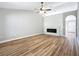 Spacious living room with modern fireplace and luxury vinyl plank flooring at 4541 Se 30Th St, Ocala, FL 34480
