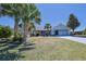 Attractive single-Gathering home with a charming front yard, a driveway, and an attached garage at 5037 Sw 109Th Loop, Ocala, FL 34476