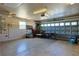 Spacious garage with ample storage, tool organization and utility capabilities within its walls at 5037 Sw 109Th Loop, Ocala, FL 34476