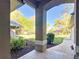 Inviting front porch with decorative columns and well-maintained landscaping at 5150 Se 47Th Court Rd, Ocala, FL 34480