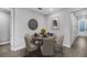 Dining room featuring a decorative clock and a table set for six people at 5270 Nw 33Rd Pl, Ocala, FL 34482