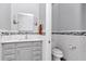 Bathroom vanity with a sink and lighting fixtures at 5560 Ne 31St Ter, Ocala, FL 34479