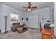 Bonus room with carpet, seating area, and Murphy bed at 5560 Ne 31St Ter, Ocala, FL 34479