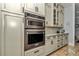 Built-in double oven and stainless steel appliances complement the custom cabinets in this kitchen at 5560 Ne 31St Ter, Ocala, FL 34479