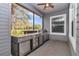 Outdoor kitchen with stainless steel grill and countertops at 5560 Ne 31St Ter, Ocala, FL 34479