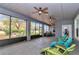 Large screened-in patio with ample seating at 5560 Ne 31St Ter, Ocala, FL 34479