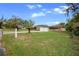 Charming home with a well-maintained front yard and a prominent mailbox displaying the house number at 5615 Se 113Th Pl, Belleview, FL 34420