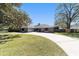 Charming single-story home with stone facade, two-car garage and long driveway at 5620 Se 9Th St, Ocala, FL 34480