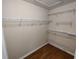 Walk-in closet with built-in wire shelving for clothes and shoe storage at 7407 Sw 112Th Pl, Ocala, FL 34476