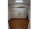 Spacious walk-in closet with custom shelving for optimal storage and organization at 7407 Sw 112Th Pl, Ocala, FL 34476