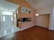 The living room flows into the kitchen, creating an inviting space for gatherings and everyday living at 7407 Sw 112Th Pl, Ocala, FL 34476