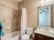 Well-lit bathroom with shower over tub at 7527 Sw 97Th Terrace Rd, Ocala, FL 34481