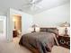 Bedroom with a doorway leading to the ensuite bathroom at 7527 Sw 97Th Terrace Rd, Ocala, FL 34481