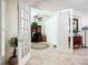 Stylish home office with ample storage, tile flooring, and natural light at 7527 Sw 97Th Terrace Rd, Ocala, FL 34481
