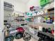 Walk-in pantry with wire shelves and ample storage space at 7527 Sw 97Th Terrace Rd, Ocala, FL 34481