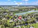 Aerial view of the community featuring a lake and the World Equestrian Center in the distance at 8033 Nw 28Th St, Ocala, FL 34482