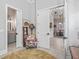 Hallway area with view into bathroom, living, and dining areas at 8033 Nw 28Th St, Ocala, FL 34482