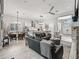 Open-concept living space combining kitchen, dining, and living areas with modern finishes at 8033 Nw 28Th St, Ocala, FL 34482
