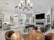 Open-concept living area showcasing a seamless flow between kitchen, dining, and living spaces at 8033 Nw 28Th St, Ocala, FL 34482