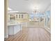 Bright kitchen and dining area with wood floors, ample counter space, and lots of natural light at 8106 County Road 109, Lady Lake, FL 32159