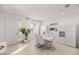 Bright dining room with white furniture, tiled floors, and ample natural light at 8802 Sw 79Th Loop, Ocala, FL 34481
