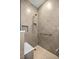 Modern tiled shower with built-in shelving and a sleek, minimalist design at 8802 Sw 79Th Loop, Ocala, FL 34481