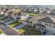 Aerial view of a neighborhood showcasing well-maintained homes and green spaces at 8899 Sw 50Th Ave, Ocala, FL 34476