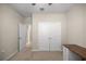 Carpeted bedroom with a closet and a built-in desk at 8899 Sw 50Th Ave, Ocala, FL 34476