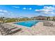 Community pool featuring plenty of lounge chairs and a covered area in a well-maintained neighborhood at 8899 Sw 50Th Ave, Ocala, FL 34476